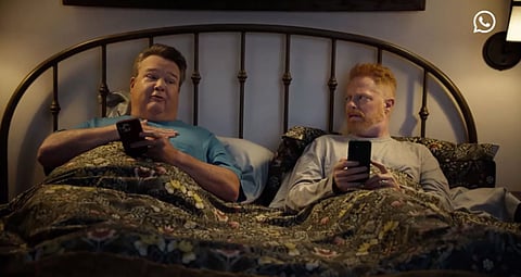 Cam and Mitchell in the WhatsApp Commercial